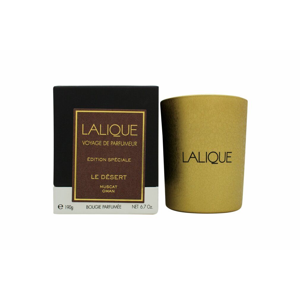 Goldfarbene Kerze und schwarze Schachtel. Aufschrift: LALIQUE, Le Désert Muscat Oman, Edition Spéciale. Netto 6.7 Oz.