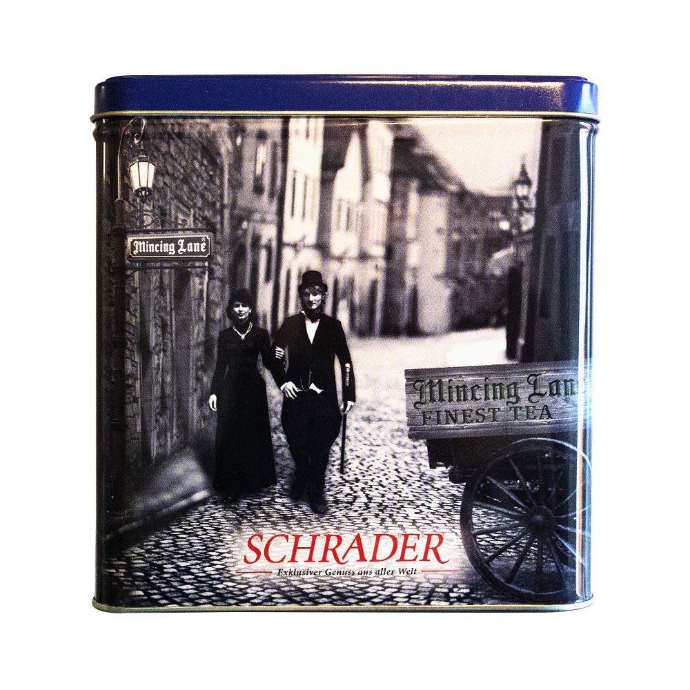 Blaue Metallbox mit historischem Straßenmotiv und Schrader-Logo. Aufschrift: Schrader, Finest Tea.