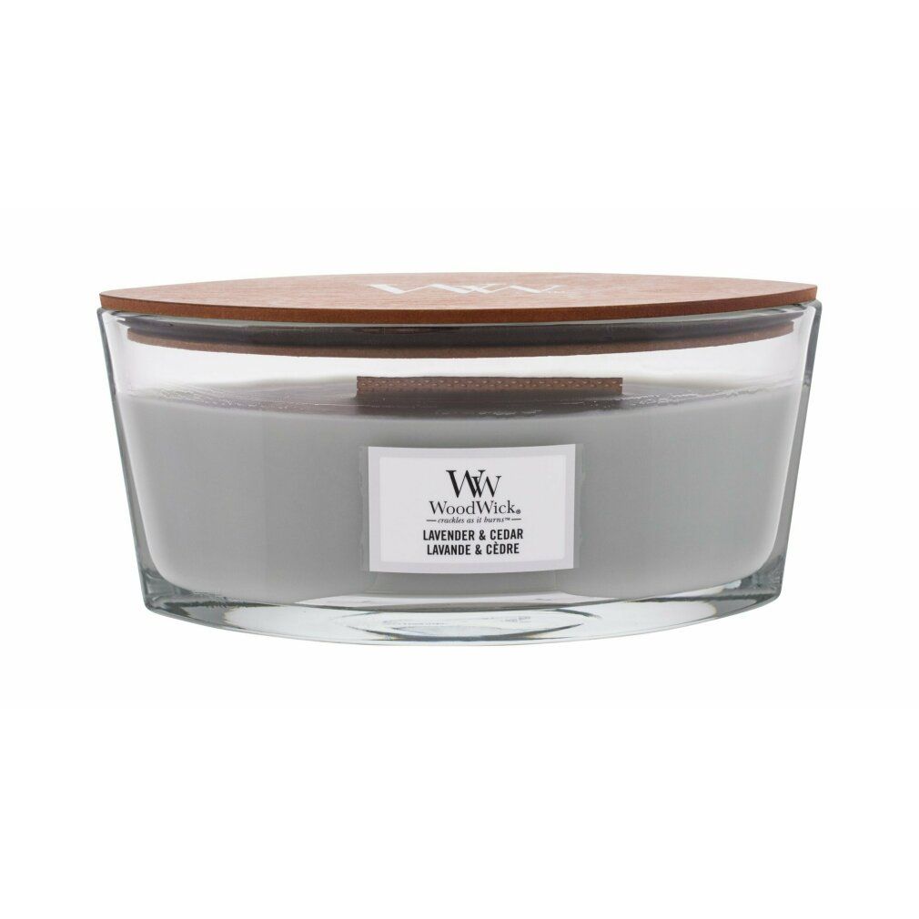 Kerze mit Holzdeckel. Aufschrift: WoodWick, Lavendel & Zeder. Glasbehälter mit hellgrauem Wachs.