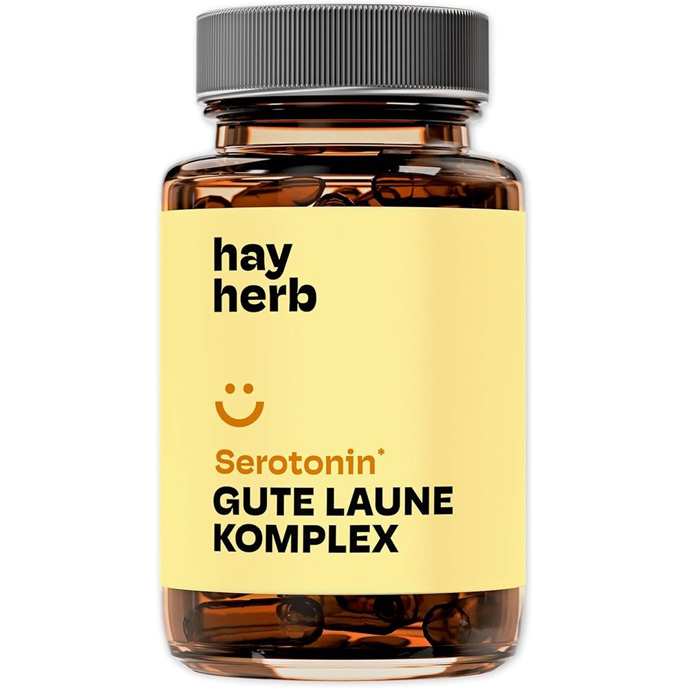 Braune Glasflasche mit Kapseln. Gelbes Etikett mit "hay herb" Logo, "Serotonin Gute Laune Komplex" und einem Smiley.
