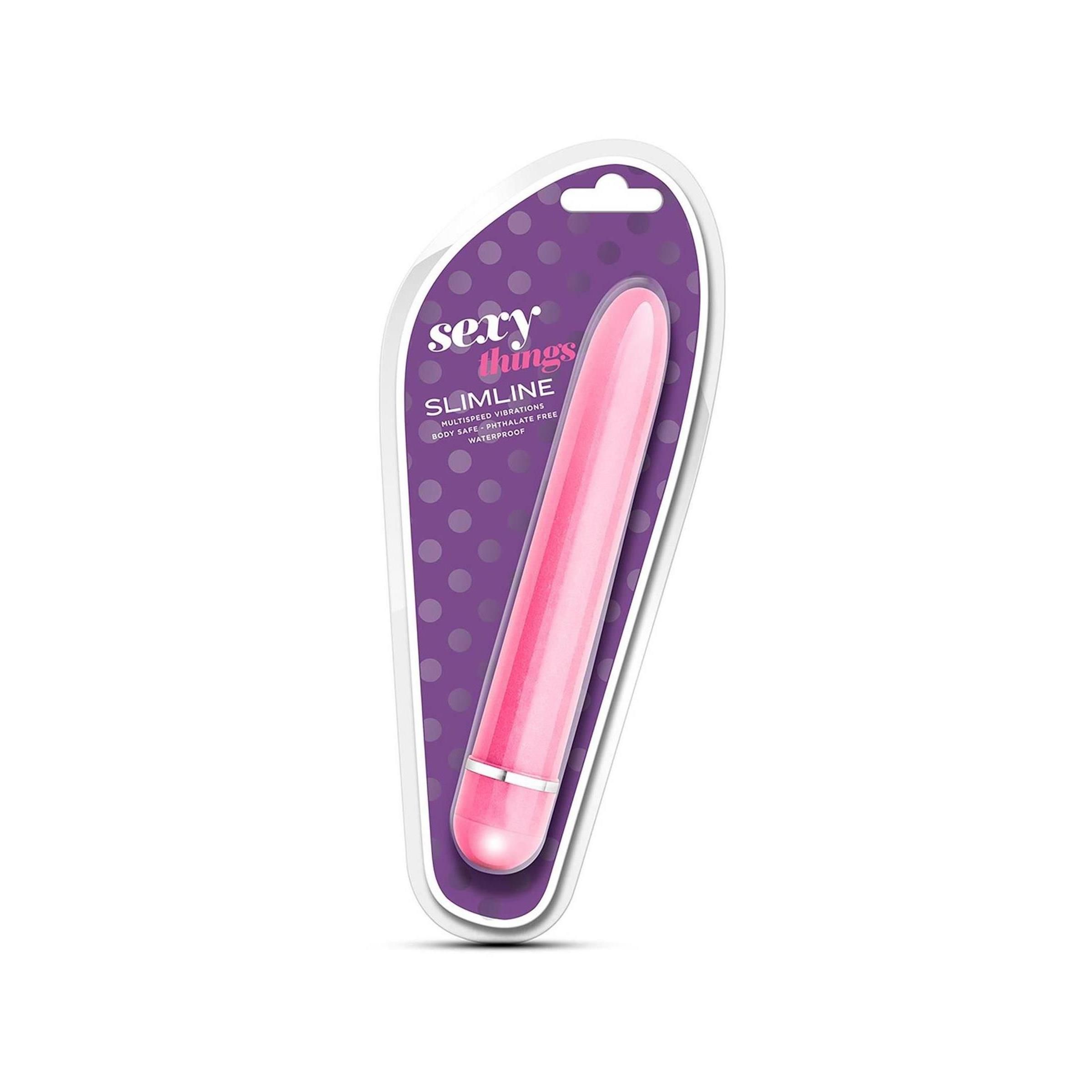 Rosa Vibrator in Verpackung. Marke: sexy things. Text: SLIMLINE VIBE. Lila Hintergrund mit weißen Punkten.