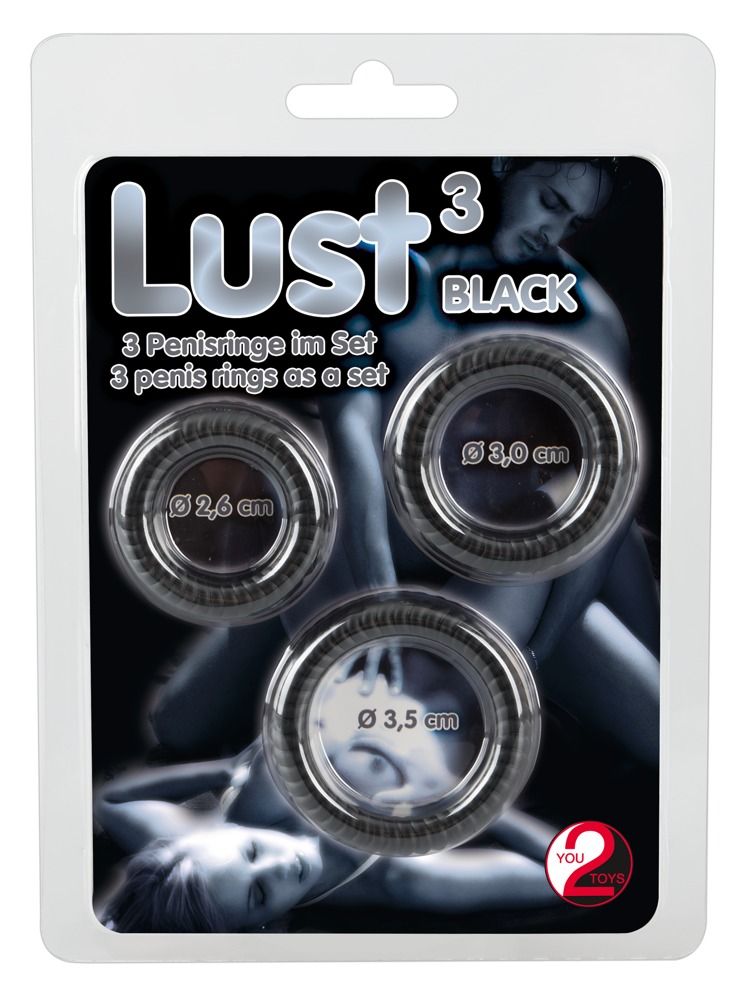Verpackung mit drei schwarzen Penisringen. Produktname: Lust³ Black. Größenangaben.