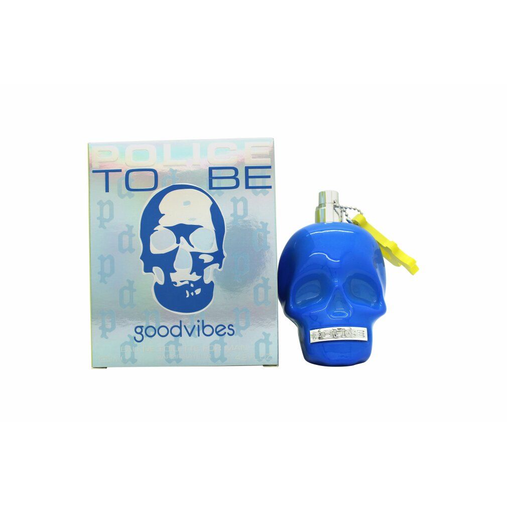 Blauer Flakon in Schädelform neben Schachtel. Schachtel mit Logo und Schriftzug "TO BE goodvibes".