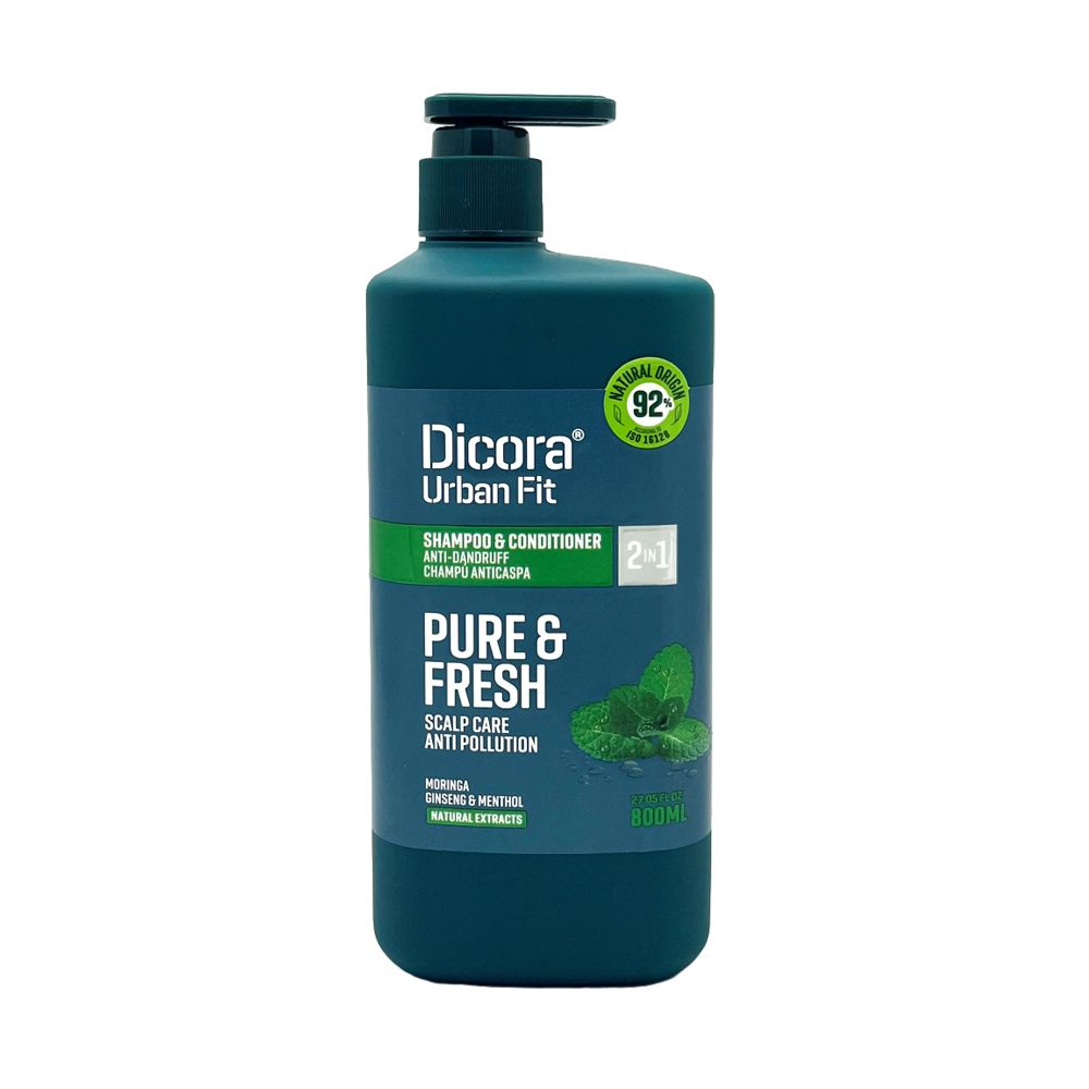 Dunkelgrüne Flasche DICORA Shampoo & Conditioner 2in1. Aufschrift: Pure & Fresh, Anti-Schuppen, 92% natürliche Inhaltsstoffe. Mit Dosierpumpe.