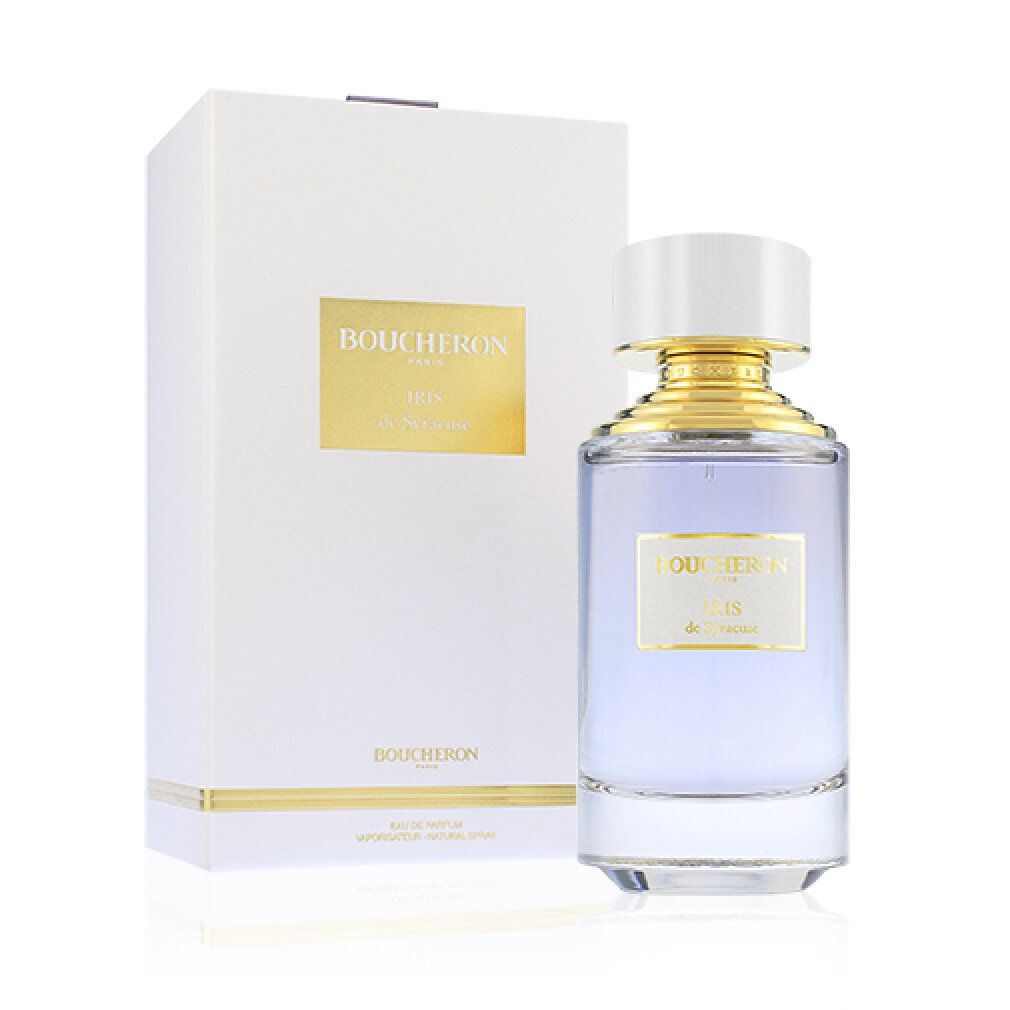 Parfümflasche und Schachtel. Flasche mit goldfarbenem Verschluss, hellblauer Flüssigkeit. Aufschrift: BOUCHERON PARIS, Iris de Syracuse.