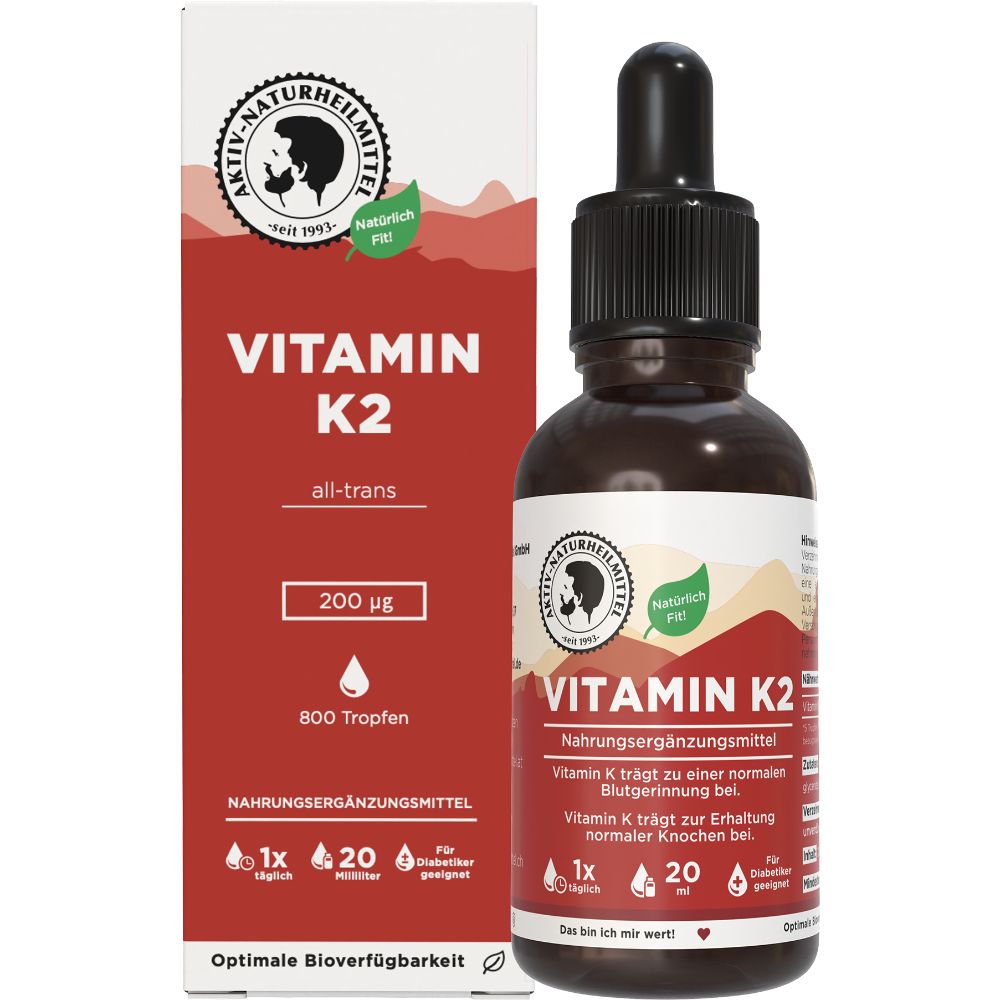 Braune Glasflasche und Karton mit "Aktiv-Naturheilmittel Vitamin K2 Tropfen". Enthält 200 µg, 800 Tropfen. "Natürlich fit"-Logo.