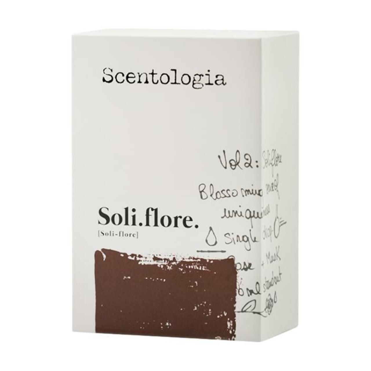 Weißer Karton mit "Scentologia" und "Soli.flore." Schriftzug. Braune rechteckige Markierung. Handschriftliche Notizen.