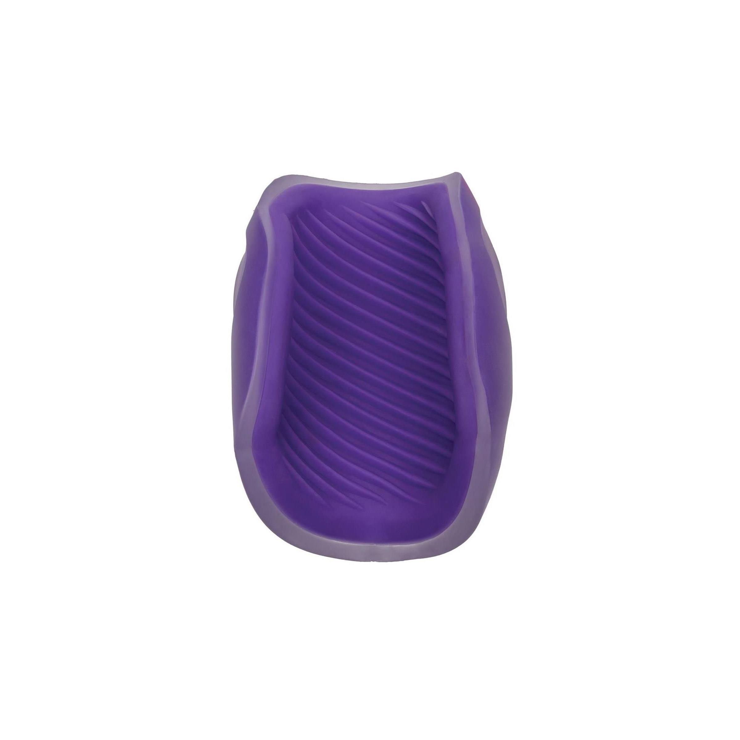 Lila Produkt mit gewellter Innenstruktur. Geformt für den Gebrauch. Auf weißem Hintergrund.
