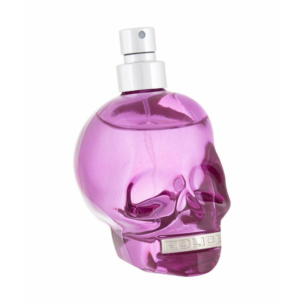 Violett-transparenter Flakon in Schädelform mit silbernem Zerstäuber.