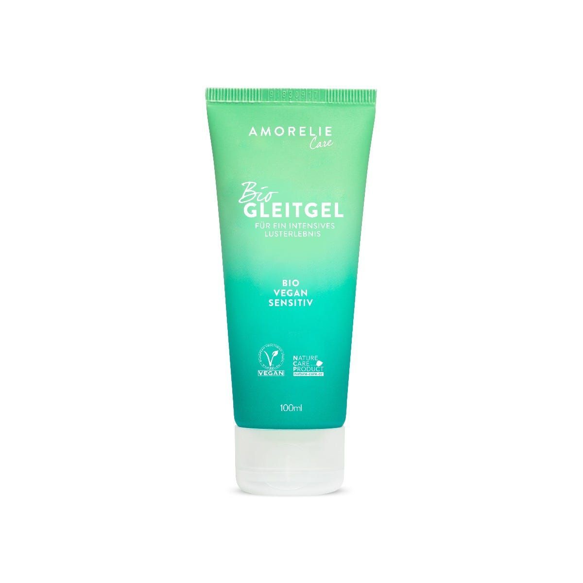 Tube verte et blanche. Inscription: AMORELIE Care, Bio Gleitgel, Bio Vegan Sensitiv. Label Vegan.