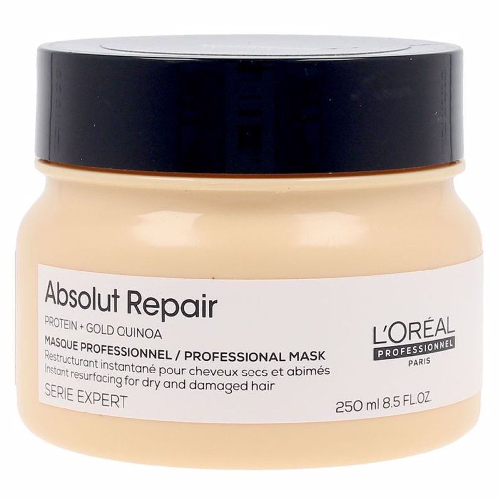 Tiegel L'Oréal Professionnel Absolut Repair Maske. Beige Tiegel mit schwarzem Deckel. Text: Absolut Repair, Serie Expert.