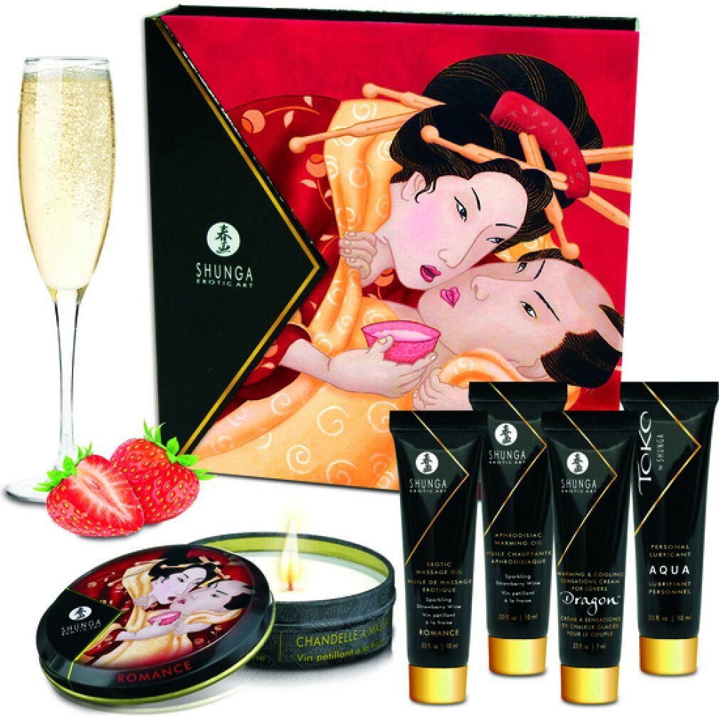 Geschenkset mit Cremes, Kerze, Dose, Erdbeeren und Sektglas. Geisha-Illustration auf der Verpackung. Schwarze Tuben.
