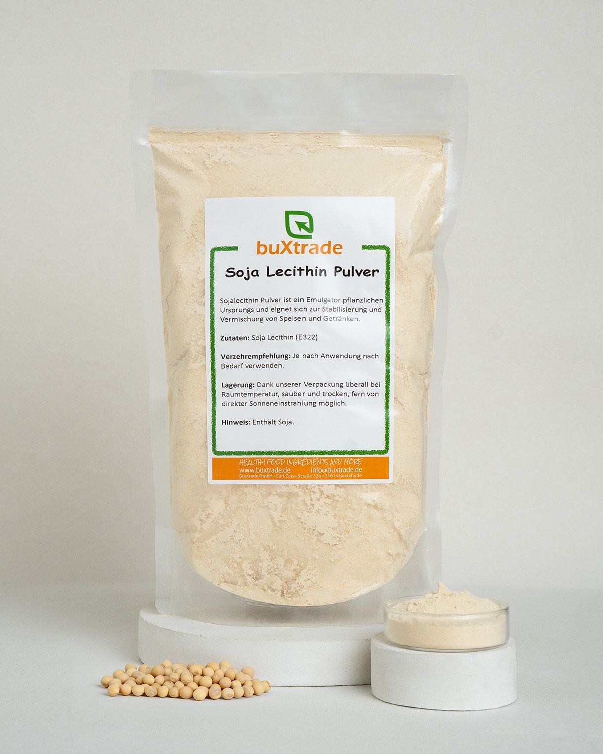 Verpackung mit Soja Lecithin Pulver, Schale und Sojabohnen.