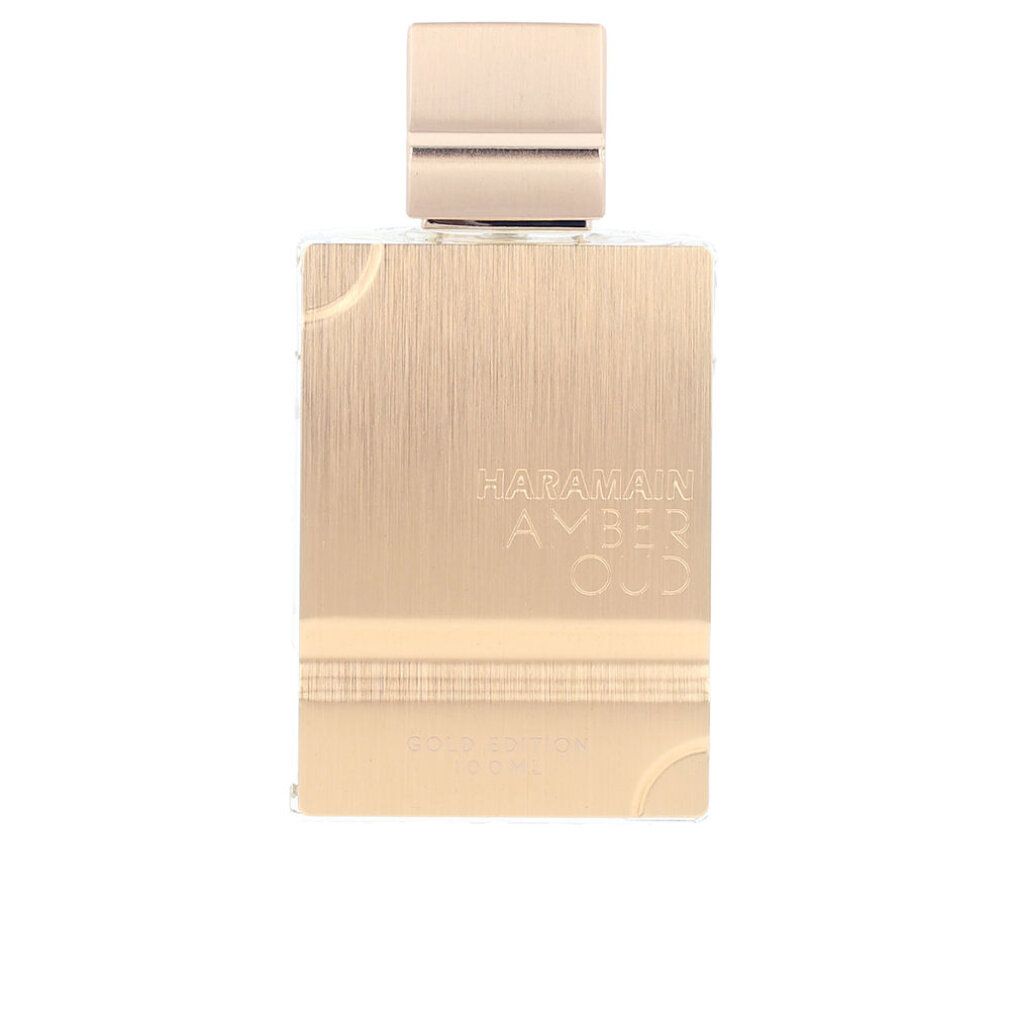 Goldfarbener Flakon mit goldfarbenem Deckel. Aufschrift: HARAMAIN AMBER OUD. Goldfarbene Front mit abgerundeten Ecken.