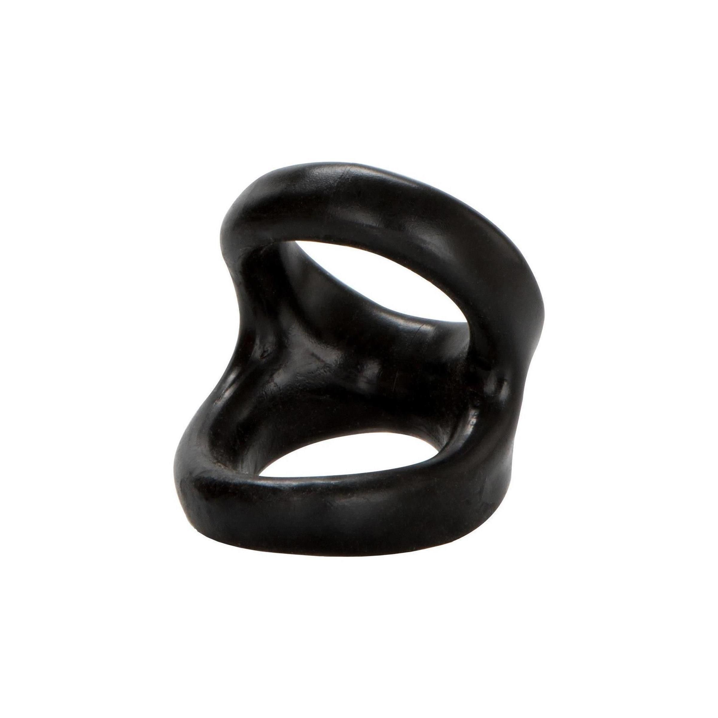 Schwarzer, ringförmiger Artikel mit einer Öffnung. Geformt für den Gebrauch. Aus glattem Material.