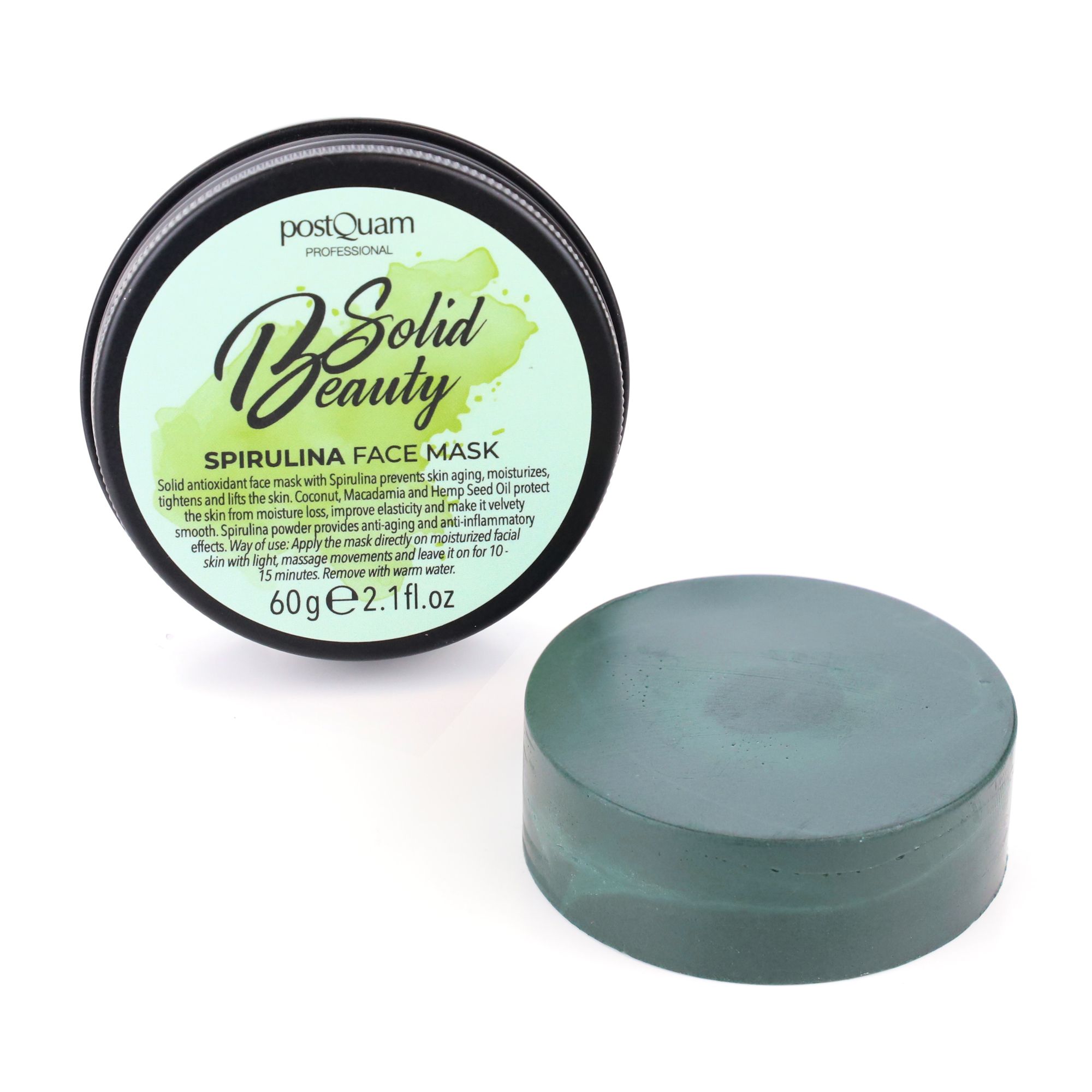 Geöffnete Dose mit grüner Gesichtsmaske. Deckel mit Aufschrift 'Solid Beauty' und 'Spirulina Face Mask'. Schwarzer Behälter, grüne Maske.