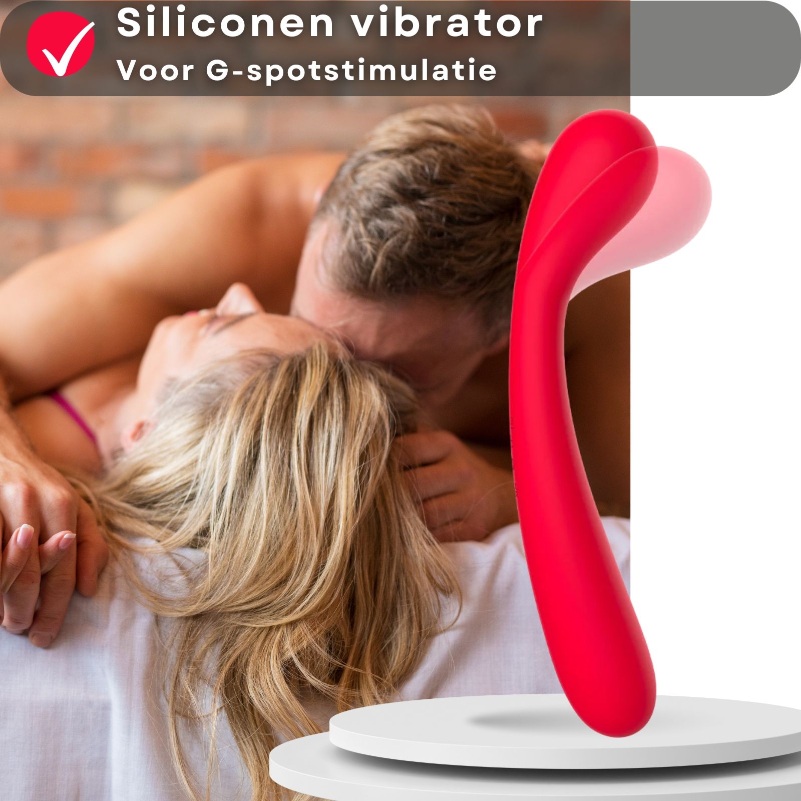 Rode vibrator. G-spot stimulatie. Siliconen. Op wit platform.