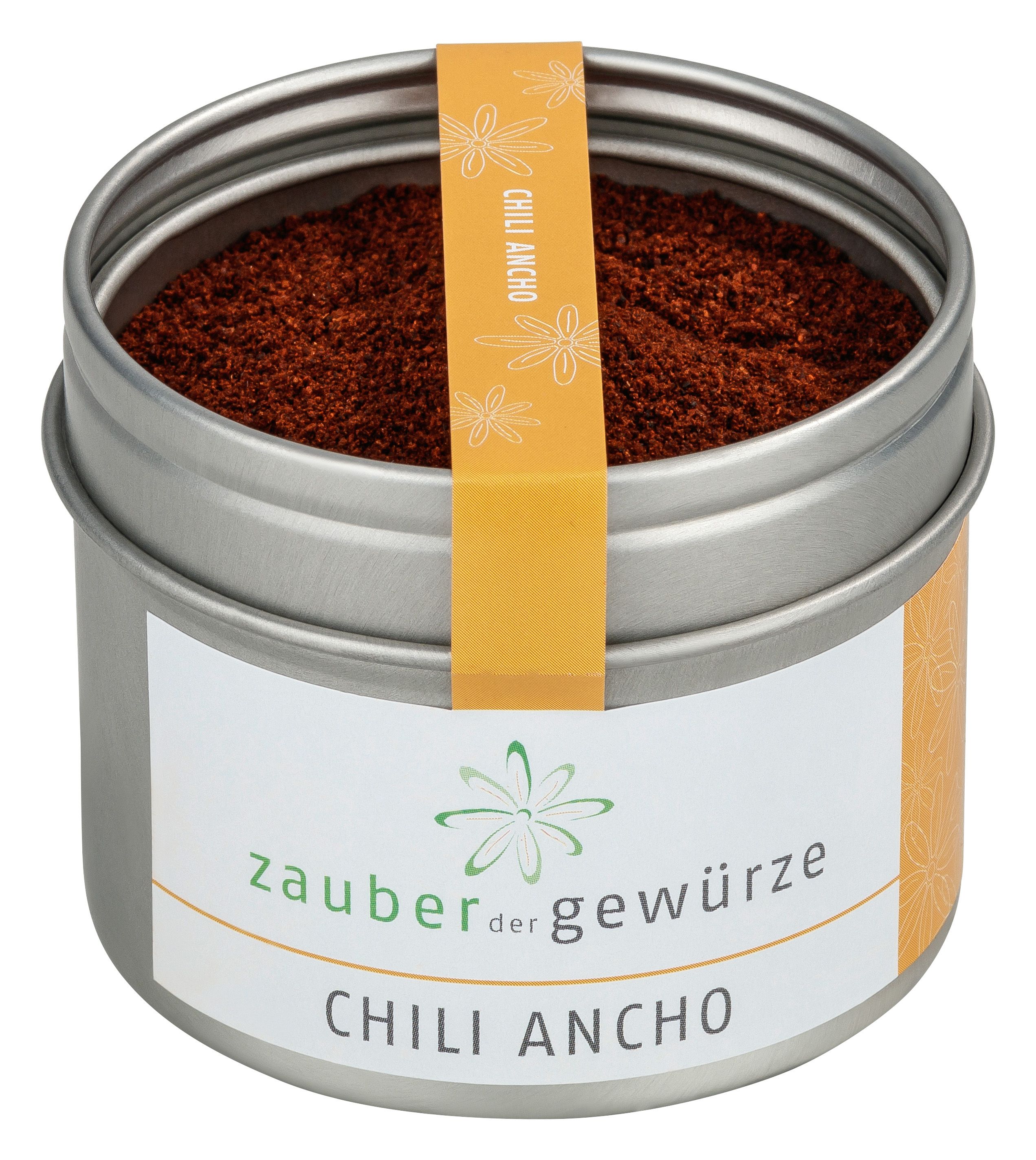 Metallbehälter mit Chili Ancho Gewürz. Etikett mit Produktname und Logo. Gelber Streifen mit Chili Ancho Schriftzug.