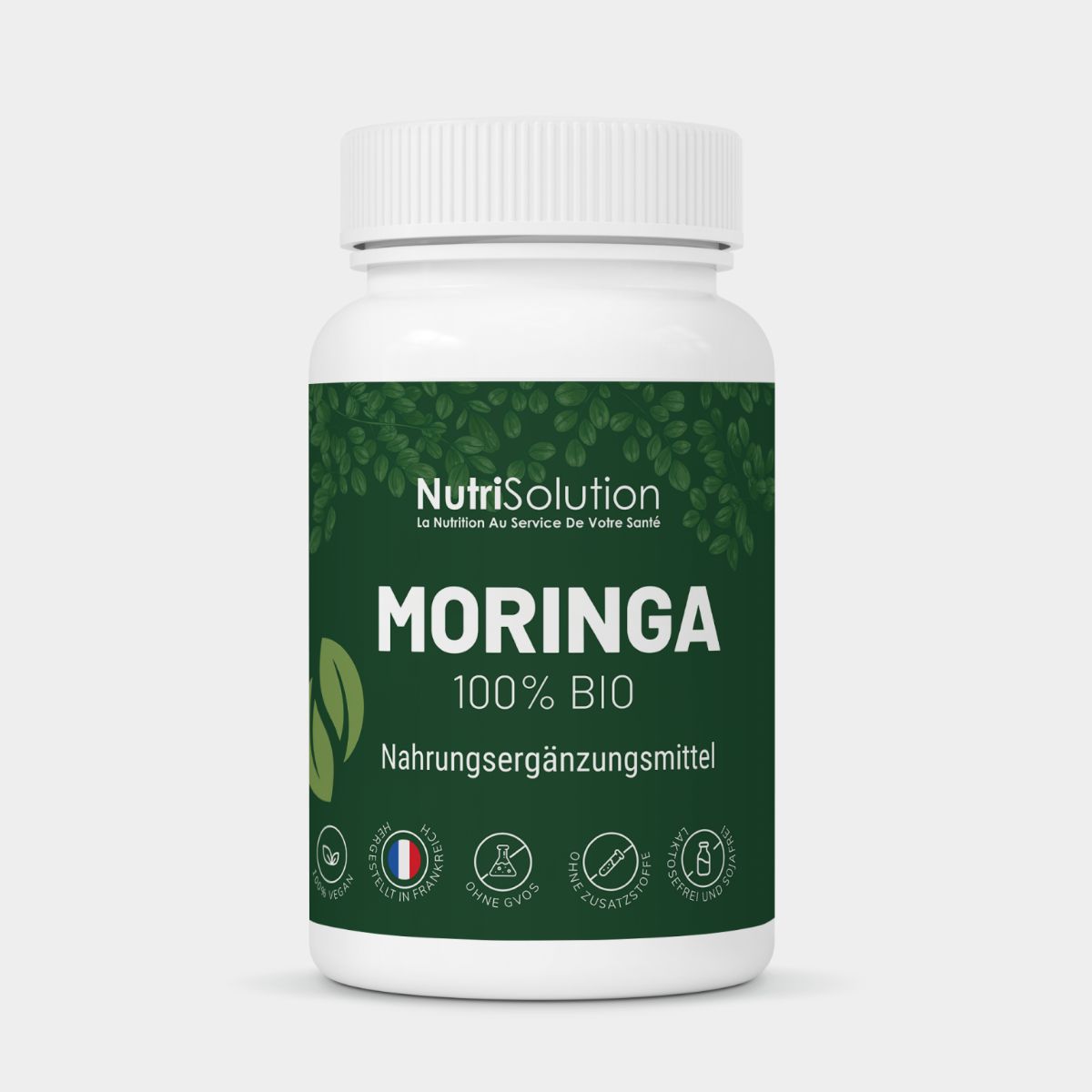 NutriSolution Moringa 100% Bio: Flasche mit Kapseln, Nahrungsergänzungsmittel. Grüne Blätter-Grafik.