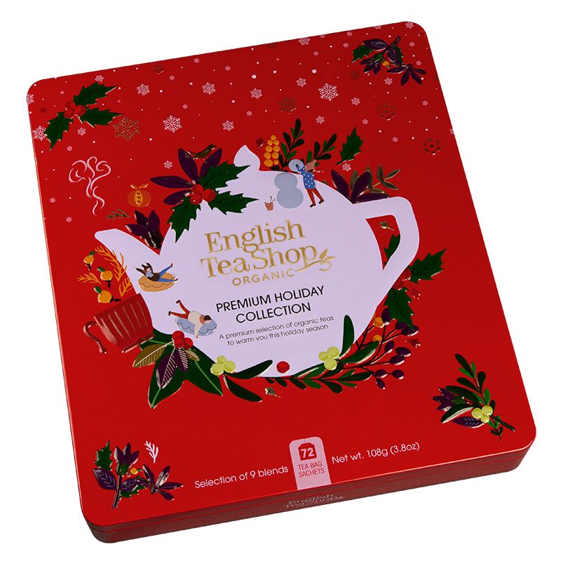 Rote Metalldose mit Weihnachtsdekor und Teekannen-Illustration. Text: English Tea Shop, Premium Holiday Collection, 72 Teebeutel.