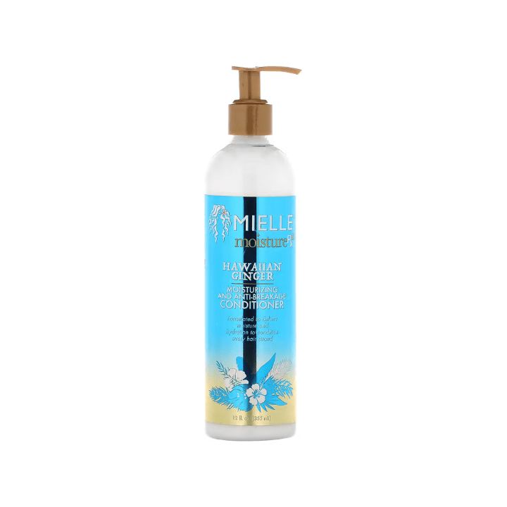 Flasche mit Spülung. Aufschrift: Mielle Moisture RX Hawaiian Ginger. Blauer Hintergrund mit floralen Elementen.