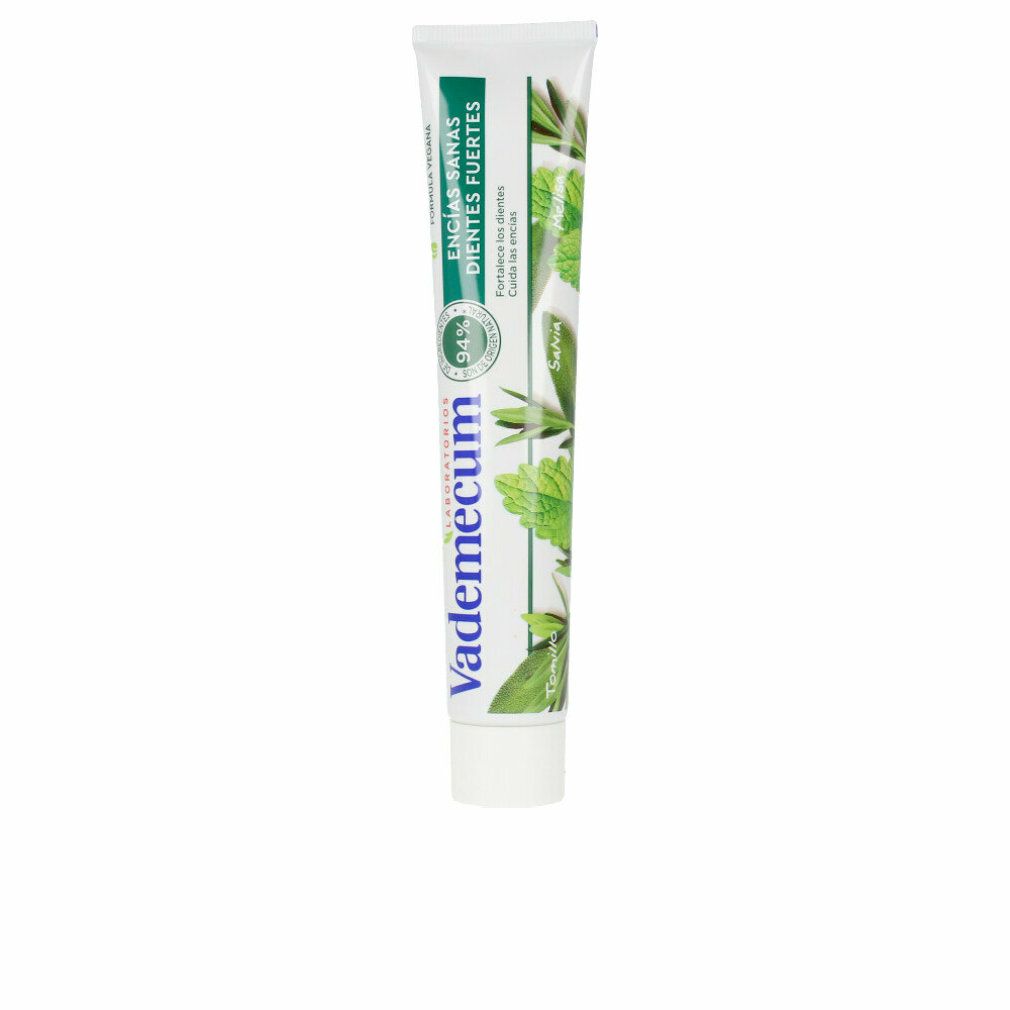 Zahnpasta-Tube mit grünem Design und Schriftzug. Aufschrift: Encías sanas, Dientes fuertes. Marke: Vademecum.