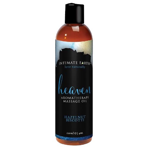 Braune Flasche mit schwarzem Deckel. Etikett mit "Intimate Earth Heaven", "Aromatherapie Massage Oil" und "Hazelnut Biscotti".