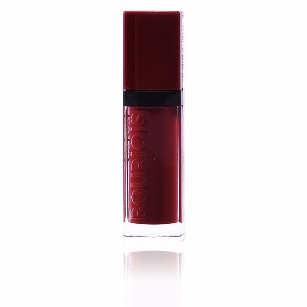 Lippenstift in einer transparenten Flasche mit rotem Deckel. Der Schriftzug BOURJOIS ist vertikal auf der Flasche zu sehen.