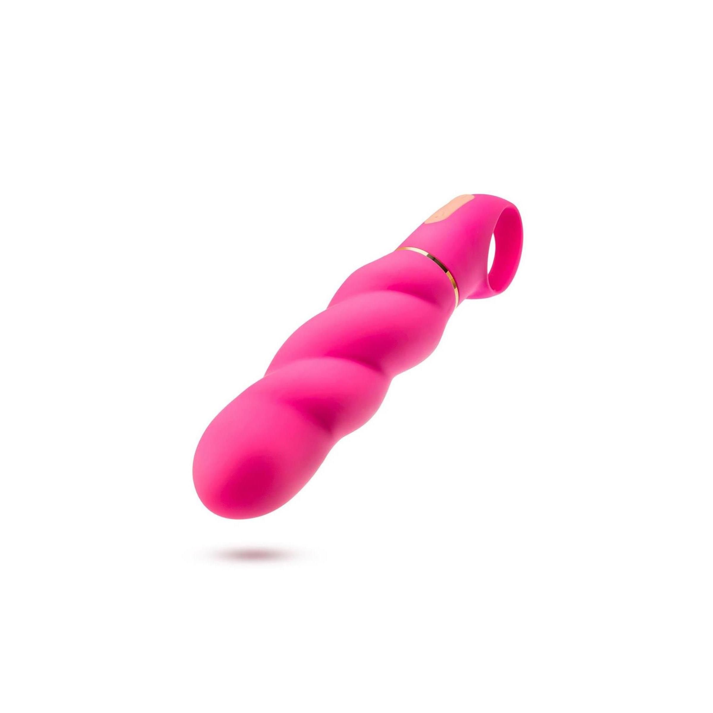 Pinkfarbenes Wellness-Produkt mit geriffelter Oberfläche und Ring. Goldfarbene Akzente. Auf weißem Hintergrund.