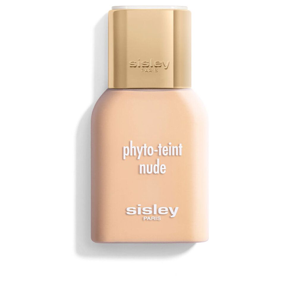 Beige Flasche mit goldfarbenem Deckel. Aufschrift: Phyto-Teint Nude und Sisley Paris.