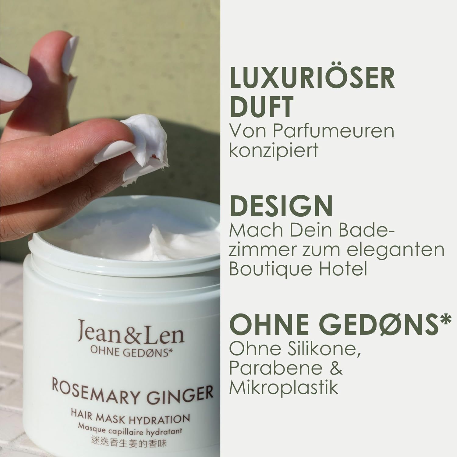 Weißes Tiegel mit Jean & Len Rosemary Ginger Hair Mask. Text: Ohne Silikone, Parabene & Mikroplastik. Hand mit Produkt.