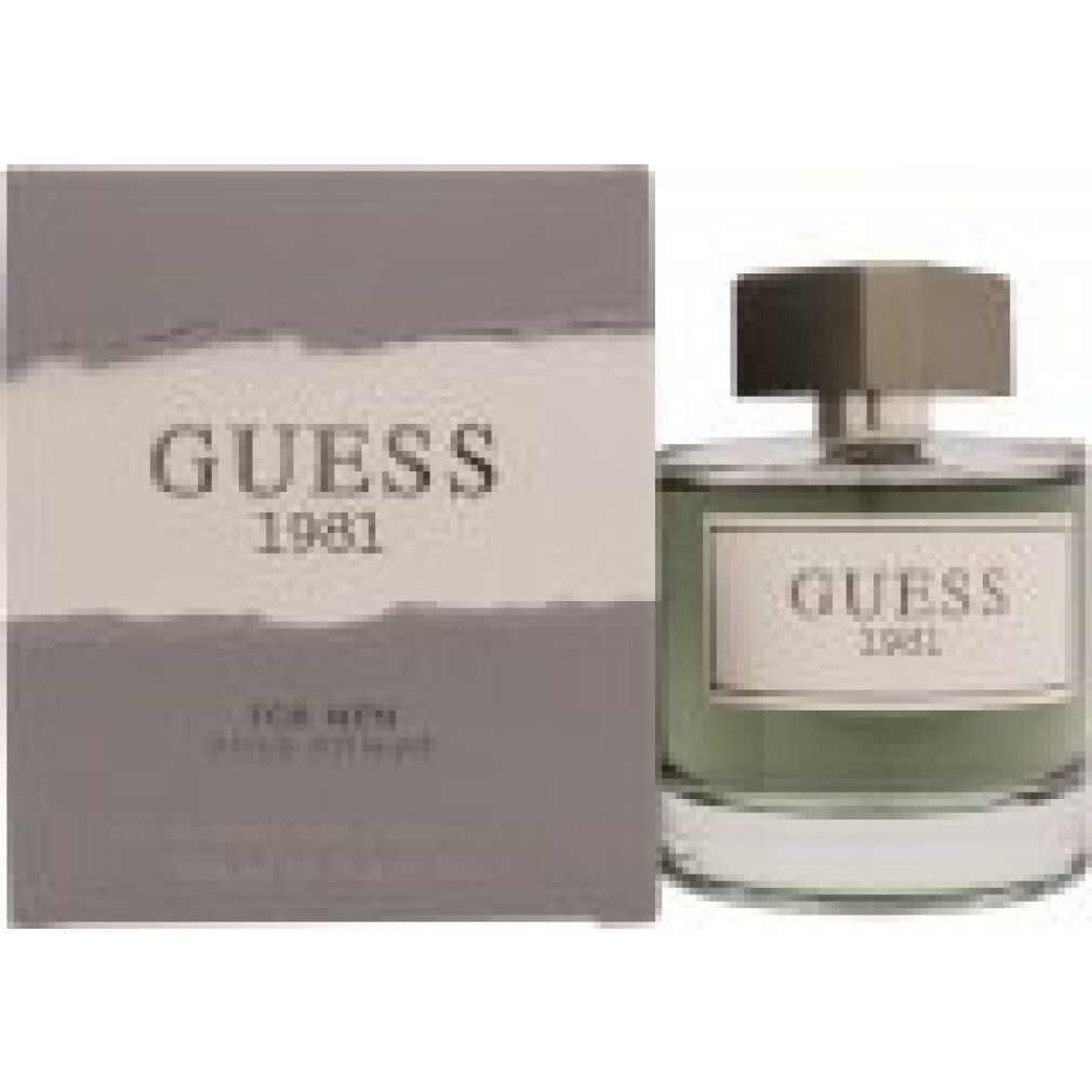 Parfümflasche und Verpackung. Flasche mit grüner Flüssigkeit, weißem Etikett "GUESS 1981". Graue Verpackung mit Logo.