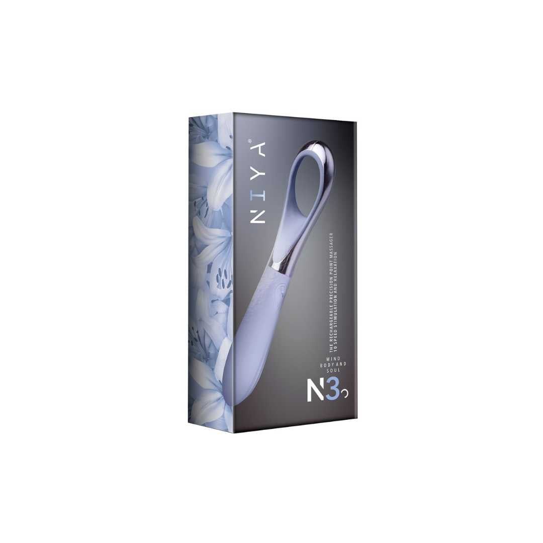 Produktverpackung mit Vibrator-Abbildung. Text: NIYA, N3, Mini-Kollektion. Floralmuster auf der Verpackung.