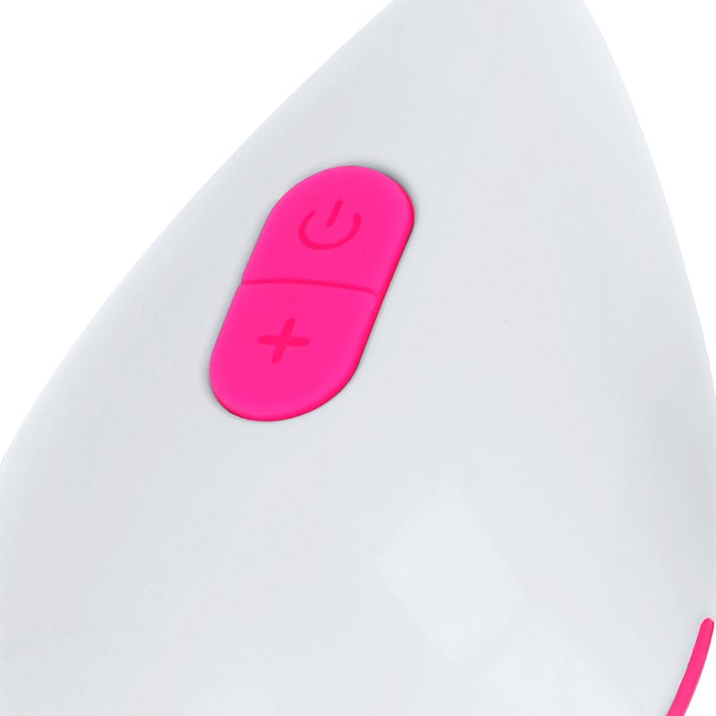 Nahaufnahme eines weißen Geräts mit pinken Knöpfen. Oben ein Ein/Aus-Symbol, darunter ein Plus-Symbol.