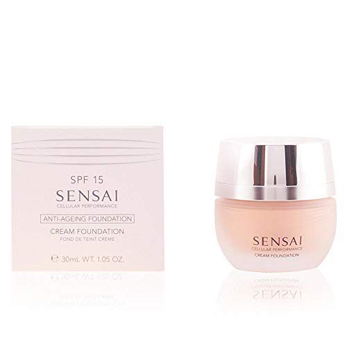 Creme-Foundation und Verpackung. Auf der Verpackung steht SPF 15, Sensai, Anti-Ageing Foundation, Cream Foundation. Das Produkt ist in einem Glasbehälter.