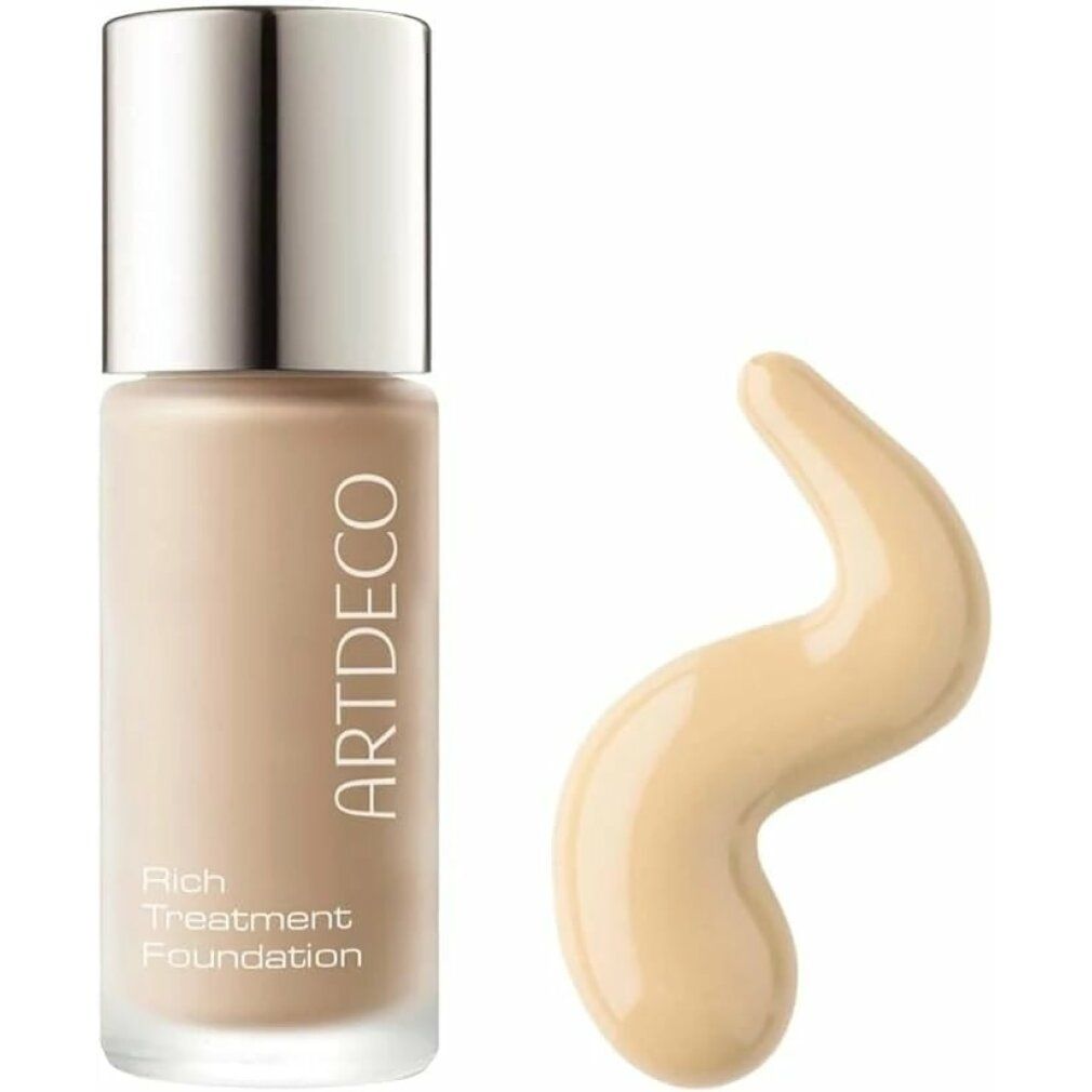 Artdeco Rich Treatment Foundation Flasche und Produktprobe. Flasche mit silbernem Deckel, Schriftzug. Probe in Wellenform.