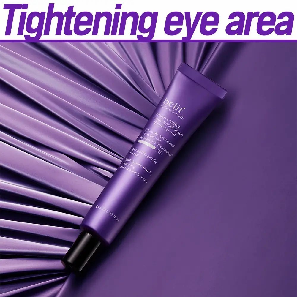 Lila Tube mit schwarzem Deckel. Aufschrift: belif, Youth creator - age knockdown V eye serum. Auf lila Hintergrund mit Text.