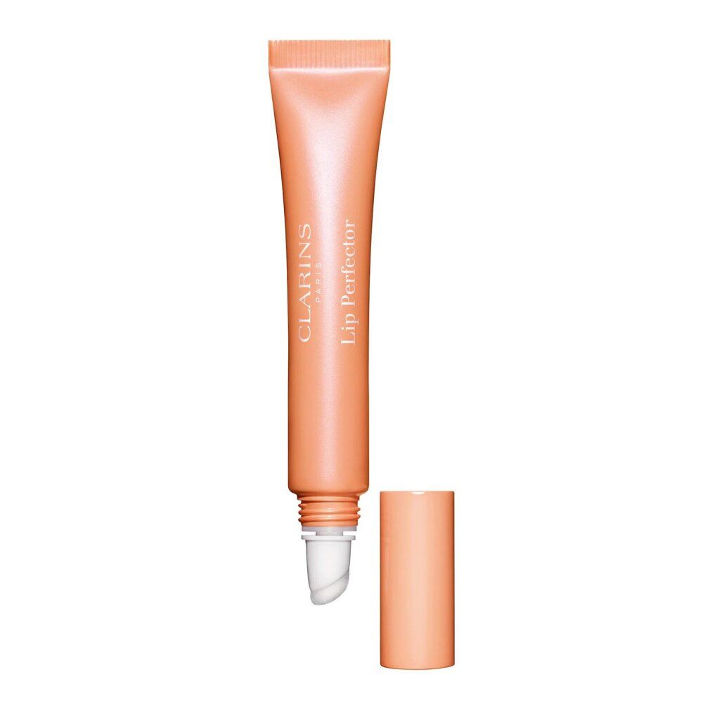 Clarins Lip Perfector in Pfirsich-Farbe. Tube mit Schraubverschluss und Applikator. Produktname und Marke sichtbar.