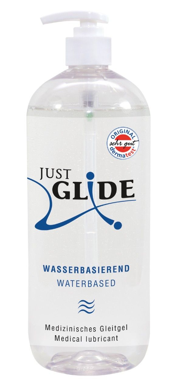 Transparente Flasche mit Dosierpumpe. Aufschrift: JUST GLIDE, Wasserbasiert, Medizinische Gleitgel. Mit Qualitätszeichen.