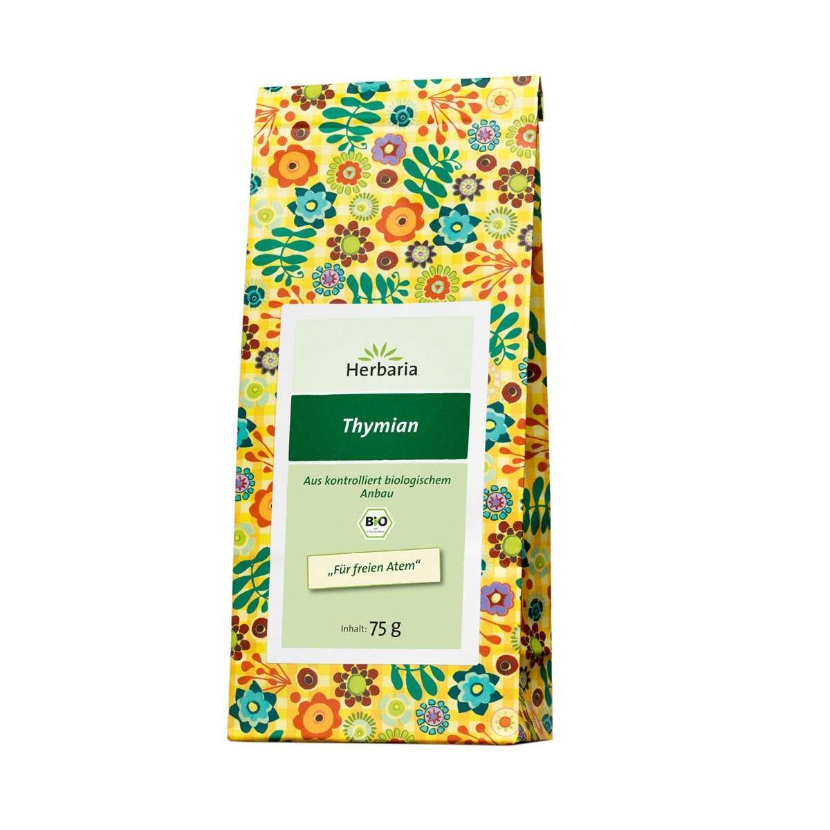 Herbaria Thymian Tee Bio. Verpackung mit floralem Muster. Enthält 75g. Bio-Siegel. Text: "Für freien Atem".