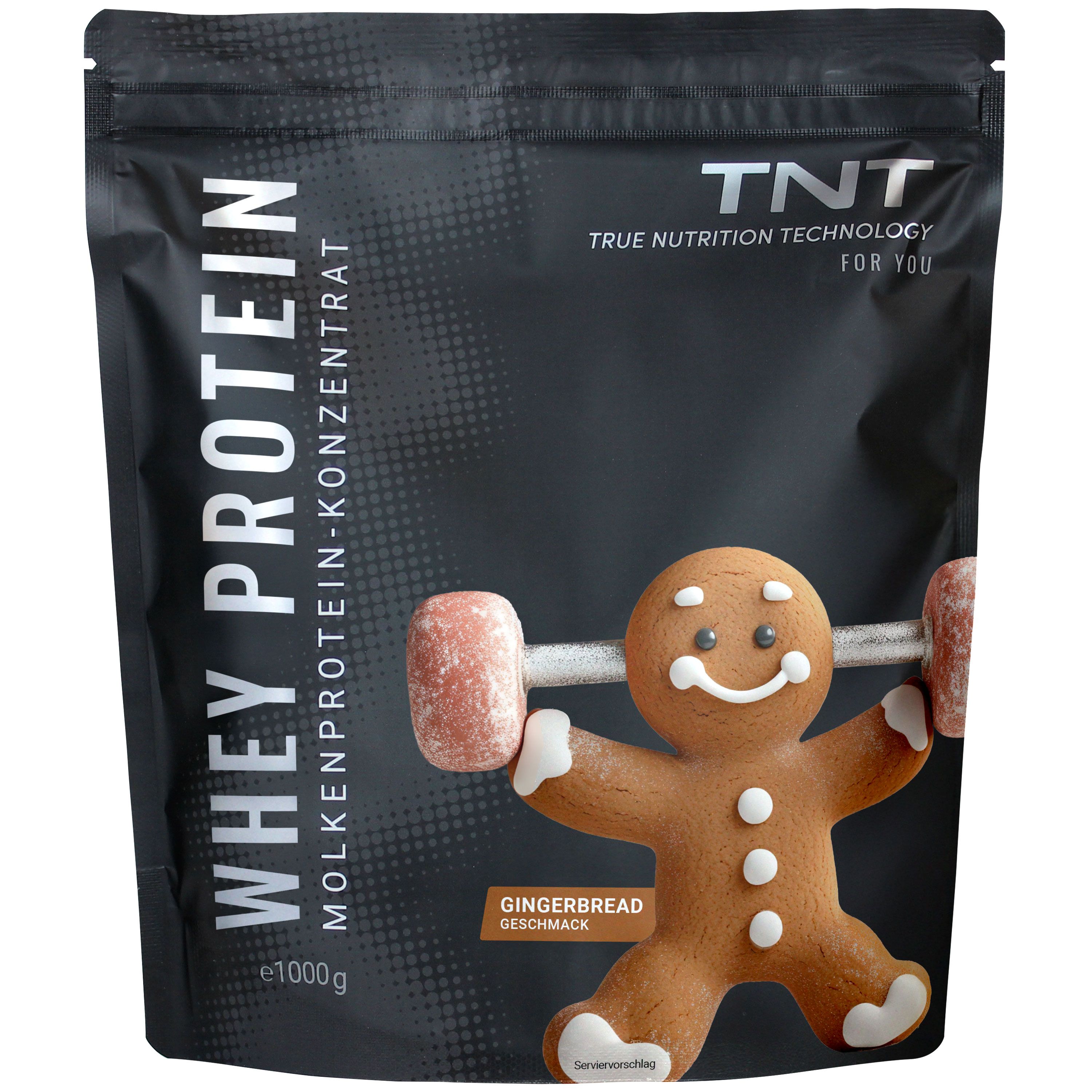 Schwarze Tüte TNT Whey Protein Konzentrat. Aufdruck: Whey Protein, Molkenprotein-Konzentrat, Gingerbread Geschmack. Abbildung eines Lebkuchenmanns.