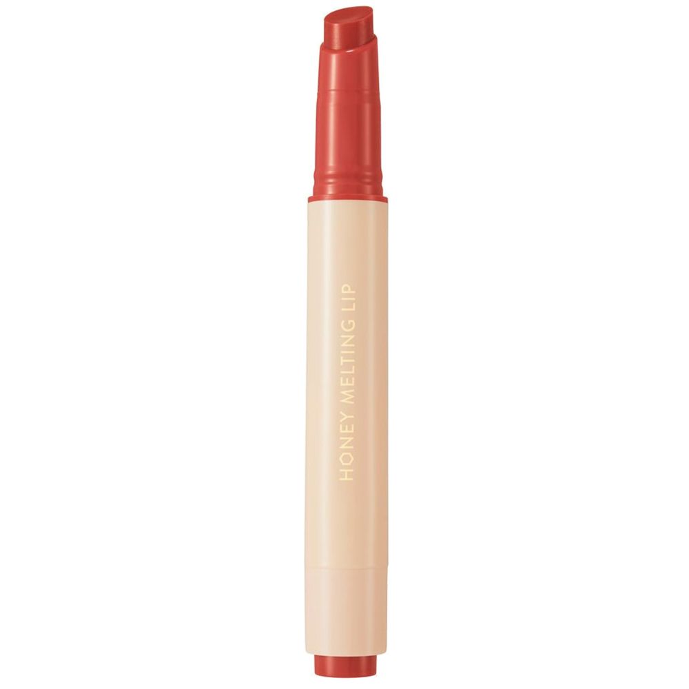 Lippenstift mit roter Spitze und cremefarbenem Gehäuse. Aufschrift "HONEY MELTING LIP".