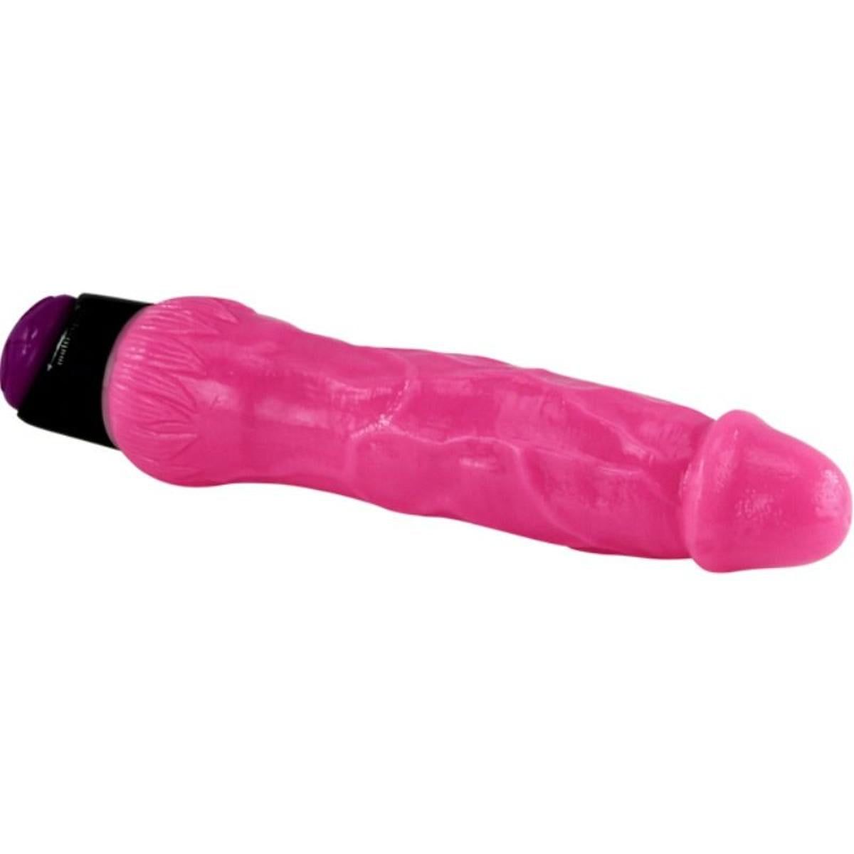 Pinkfarbener Vibrator mit schwarzem Sockel und lila Knopf. Seitliche Ansicht. Oberfläche strukturiert.