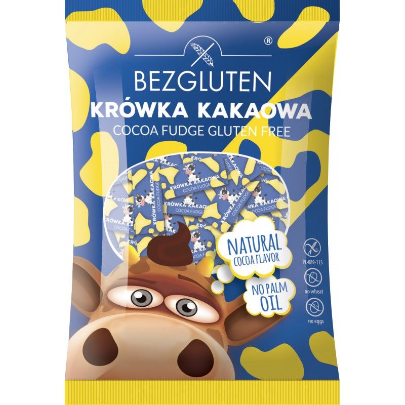 Verpackung mit Aufdruck "BEZGLUTEN". Text: "KRÓWKA KAKAOWA COCOA FUDGE GLUTEN FREE". Enthält Bonbons. Aufdrucke: "NATURAL COCOA FLAVOR", "NO PALM OIL".