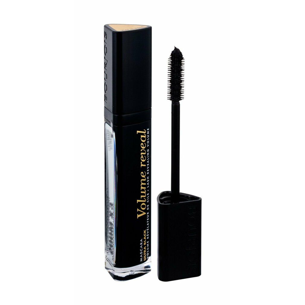 Schwarze Mascara-Tube mit Bürste. Aufschrift: Volume Reveal. Bürste mit Borsten. Goldfarbene Schrift.