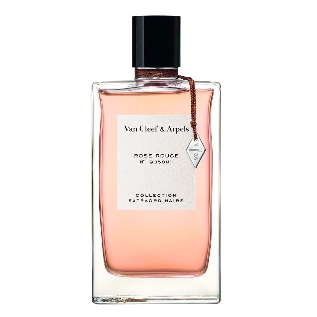Van Cleef & Arpels Rose Rouge EdP Nat. Spray. Rechteckiger Flakon mit schwarzem Verschluss und Anhänger. Rosa Flüssigkeit sichtbar.