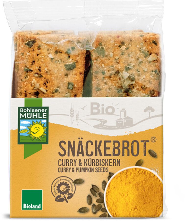 Verpackung mit Snäckebrot Curry & Kürbiskern. Bio-Siegel. Sichtbar: Brot, Currypulver, Kürbiskerne.