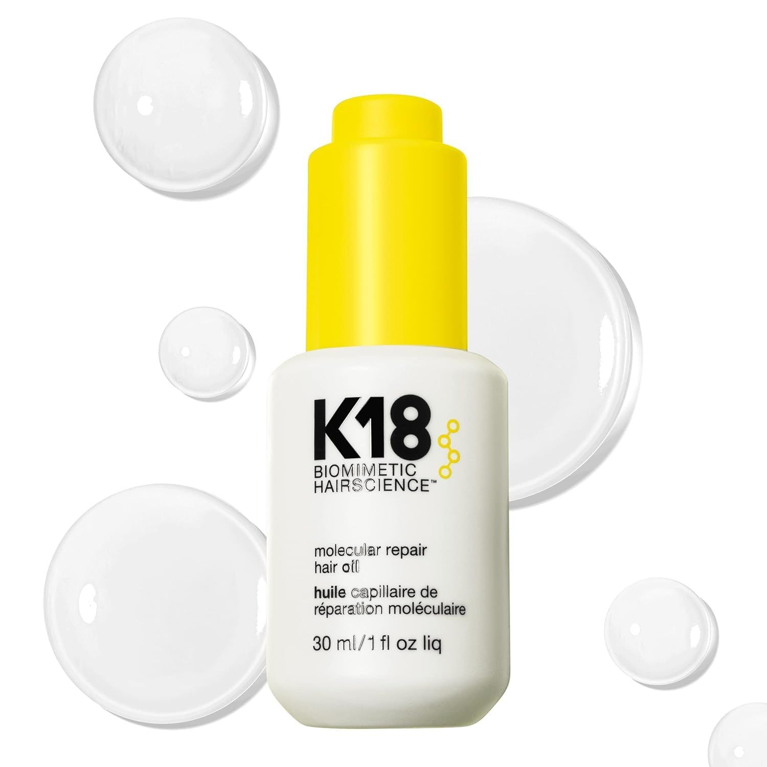 K18 Olio Riparatore Molecolare für Capelli. Flasche mit gelbem Deckel. Text: 30 ml / 1 fl oz liq. Weiße Tropfen.