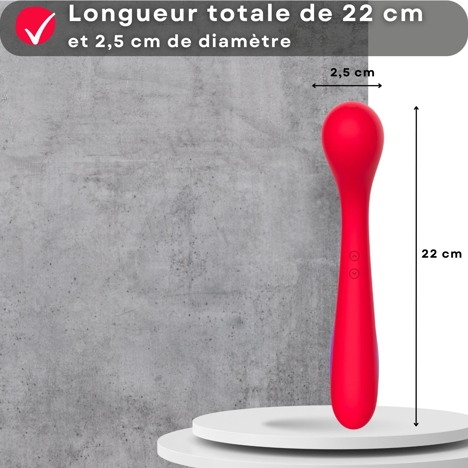 Vibrateur rouge. 22 cm long, 2,5 cm de diamètre. Sur plateforme blanche.