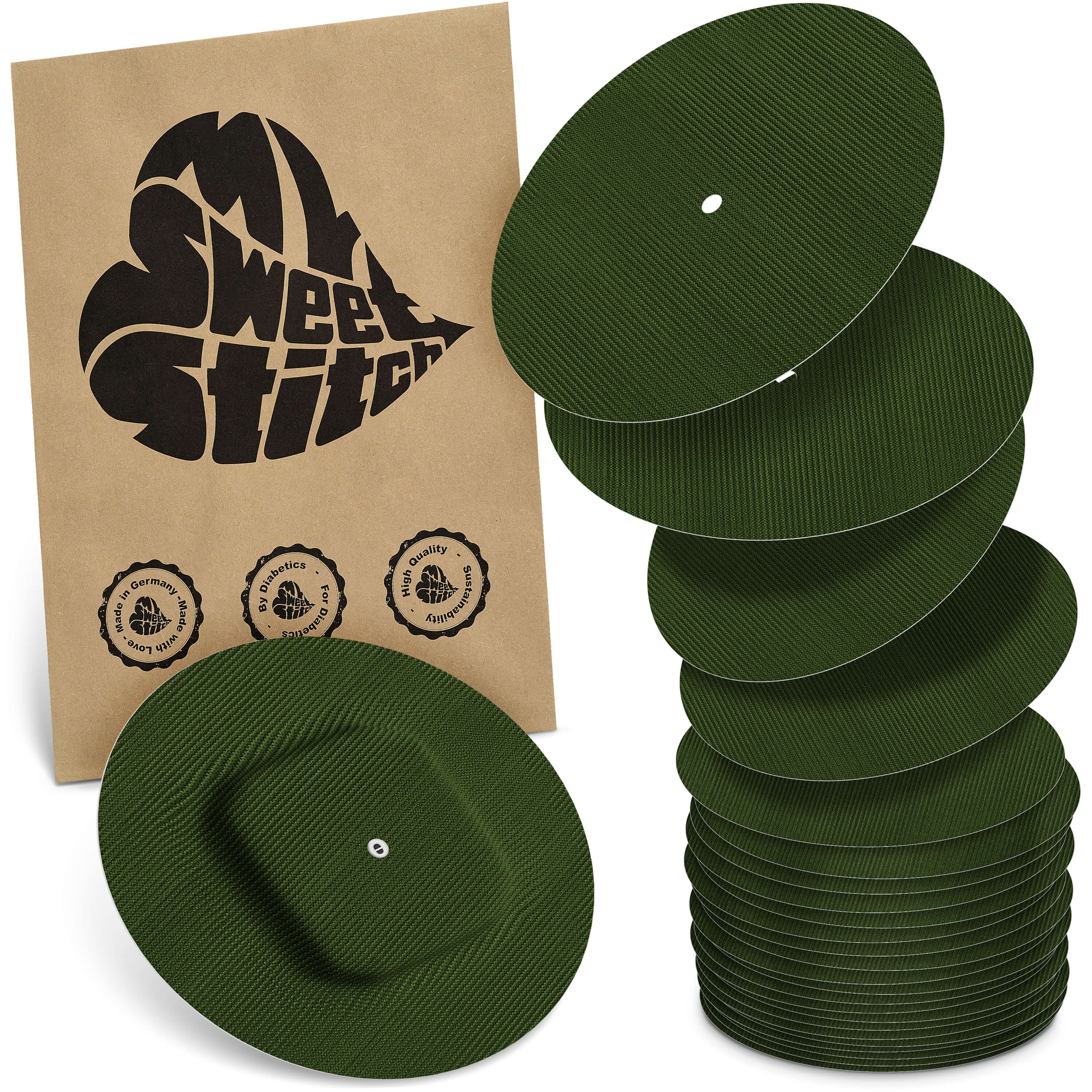 Runde, grüne Pflaster mit einem zentralen Loch. Eine Packung mit dem Logo "My Sweet Stitch" und Qualitätszeichen.